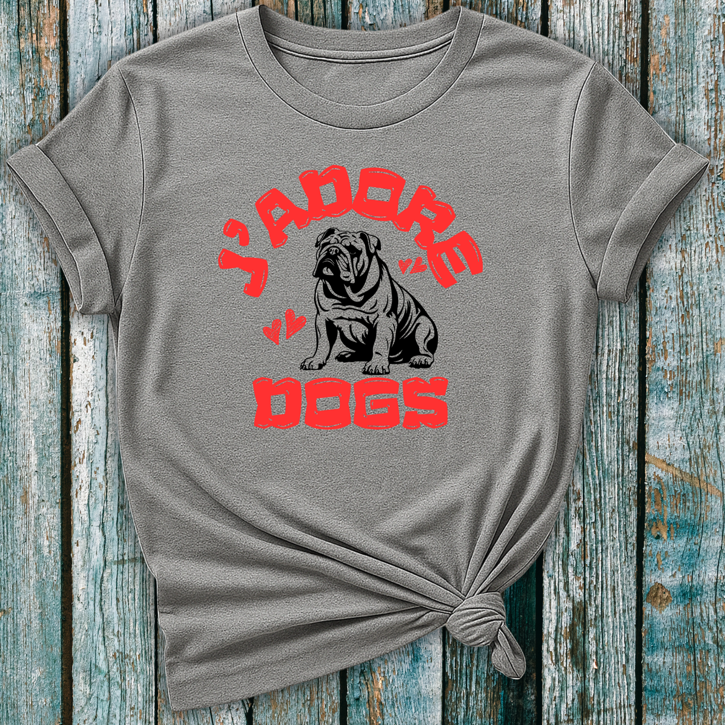 Gray t-shirt with 'J'Adore Dogs' red and black bulldog graphic on a wooden surface