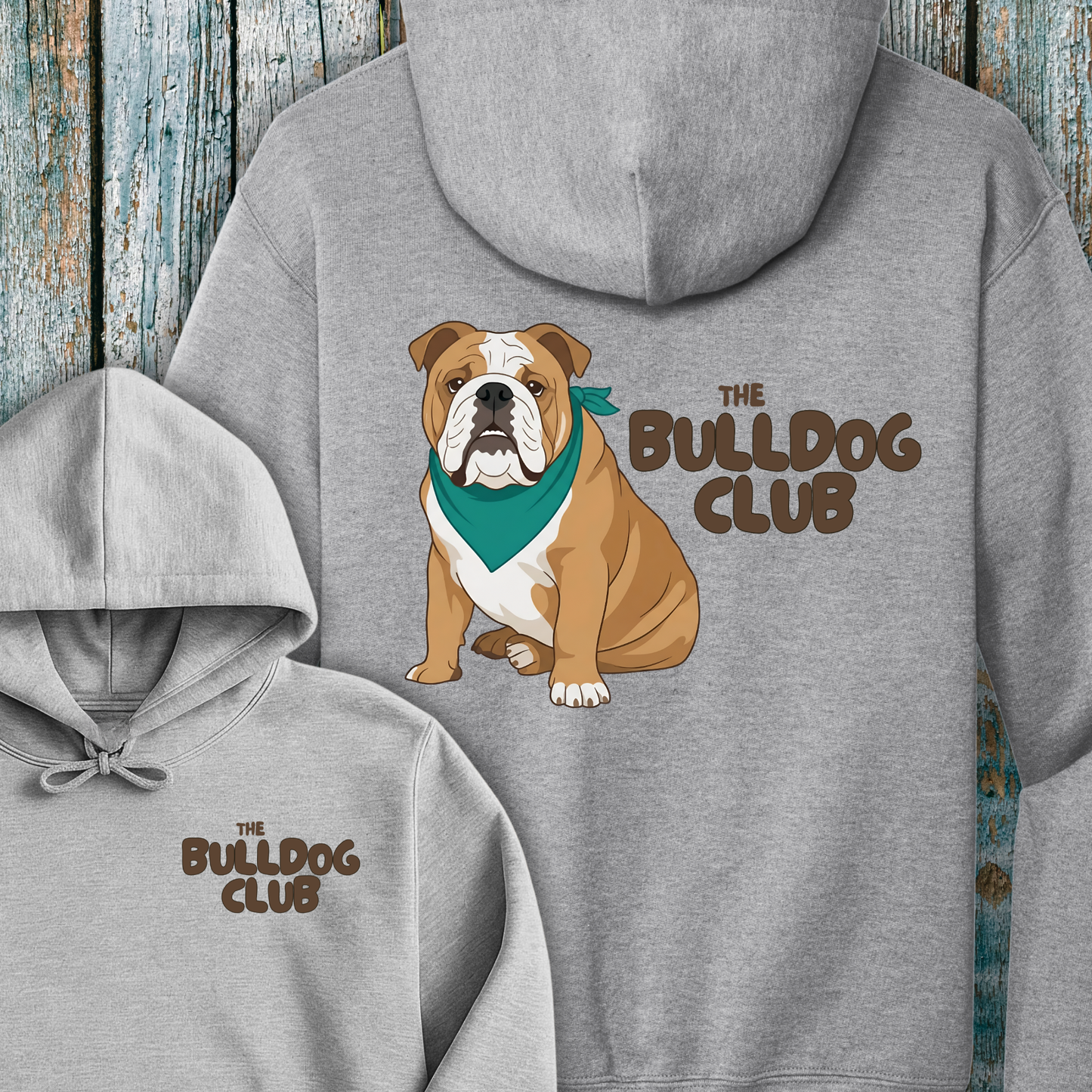 Gray hoodie with a bulldog graphic and 'The Bulldog Club' text on a wooden background