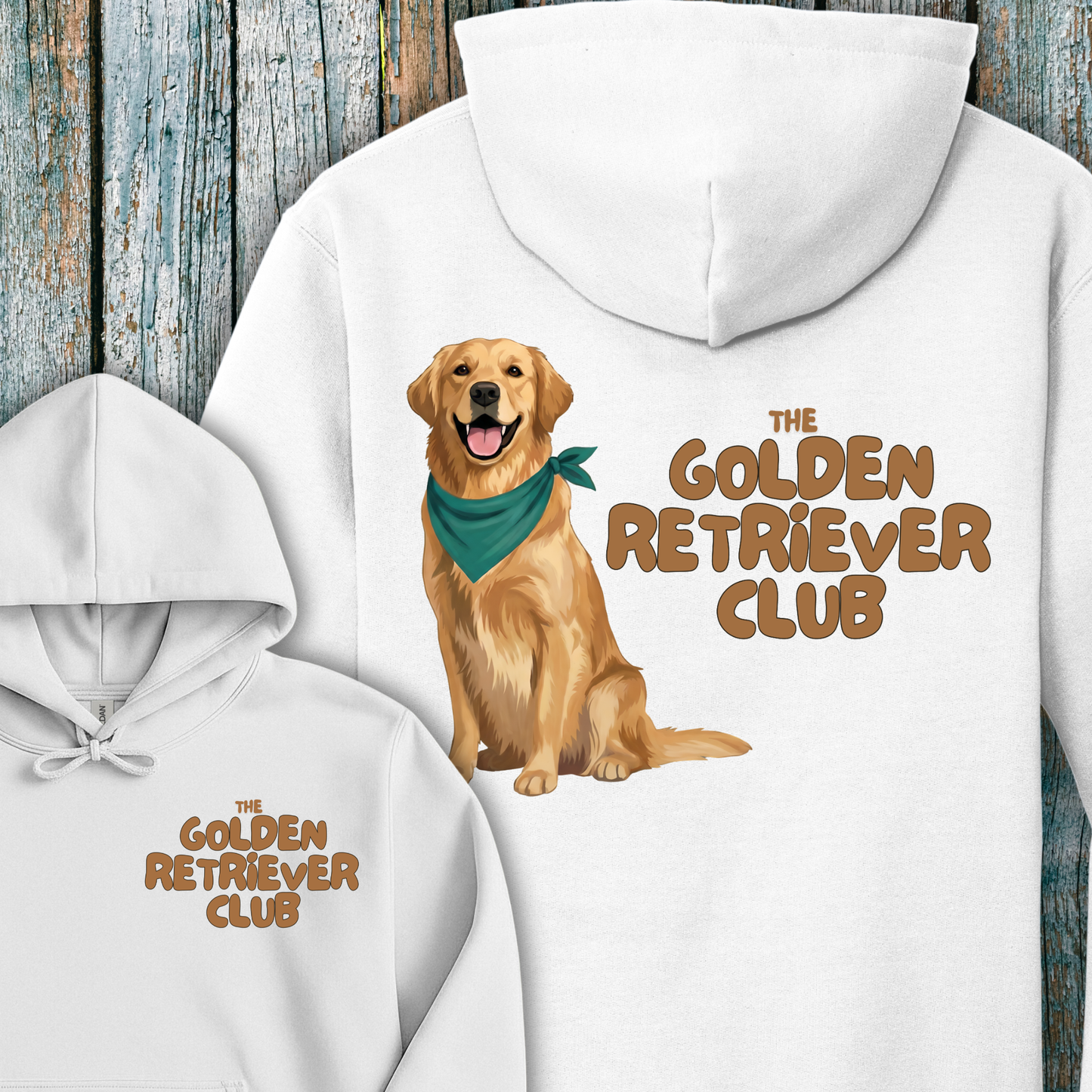 White hoodie with a Golden Retriever illustration and 'The Golden Retriever Club' text on a wooden background.