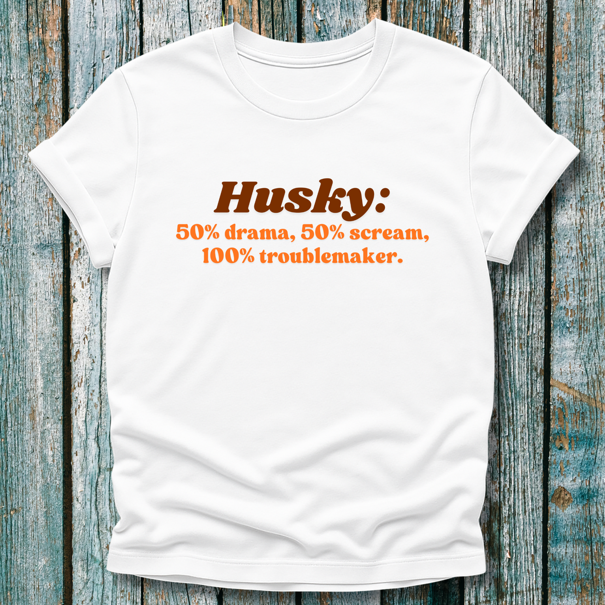 White t-shirt with Husky definition with orange and brown text 