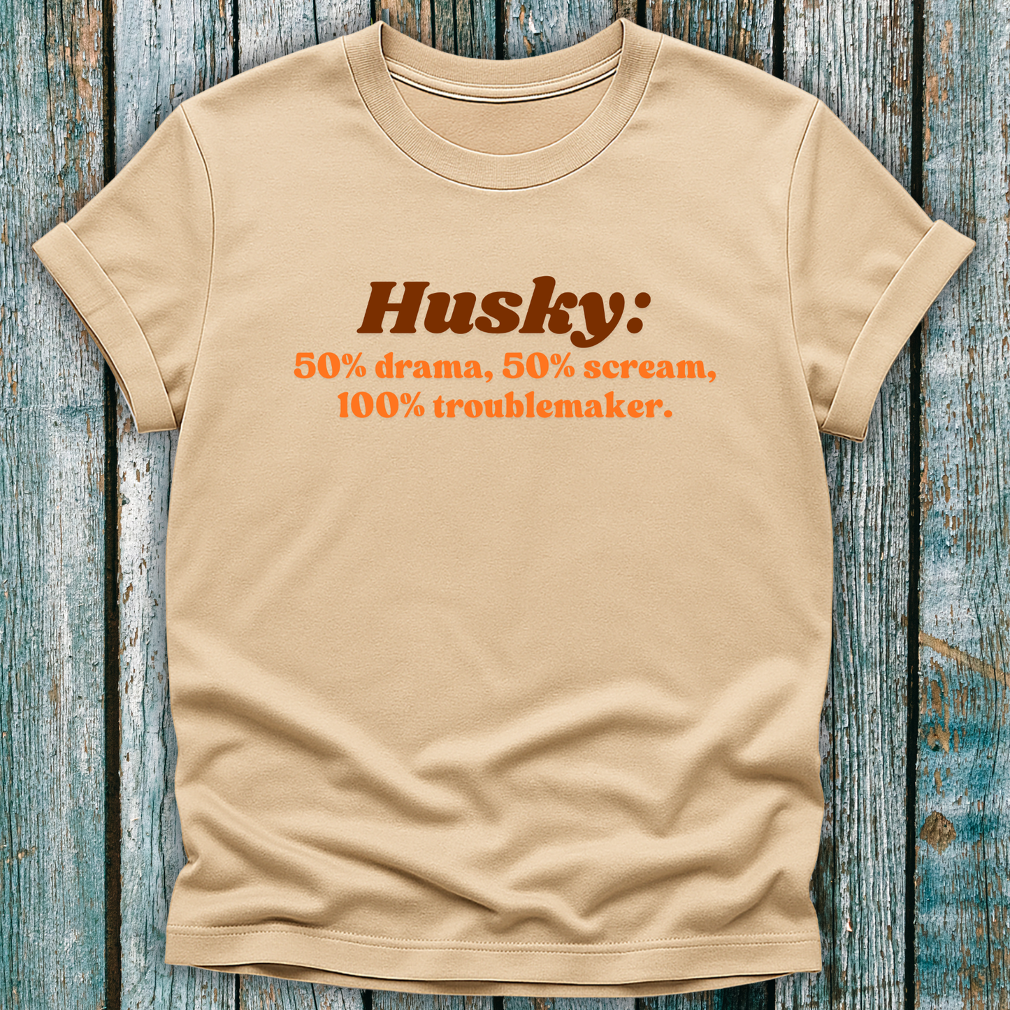 Beige t-shirt with Husky definition with orange and brown text 