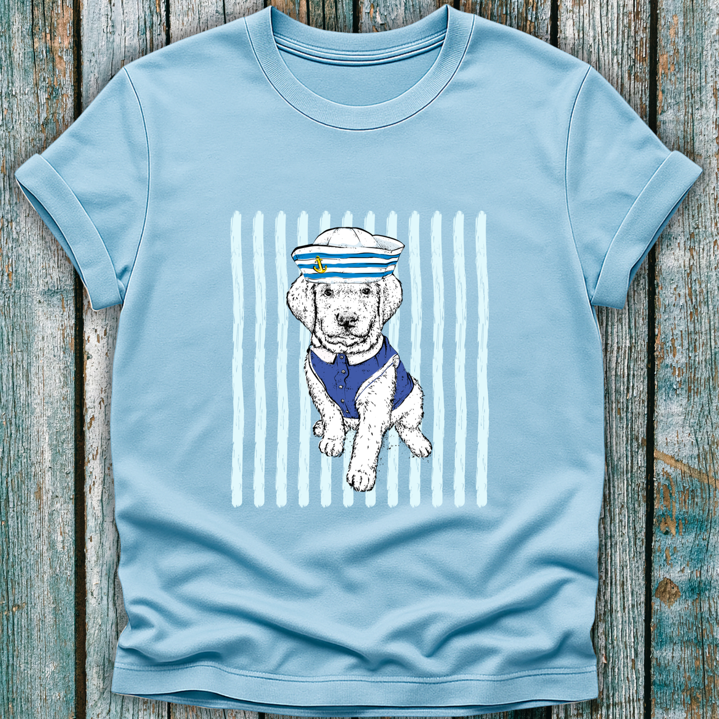 Light blue t-shirt with a dog in a sailor outfit graphic