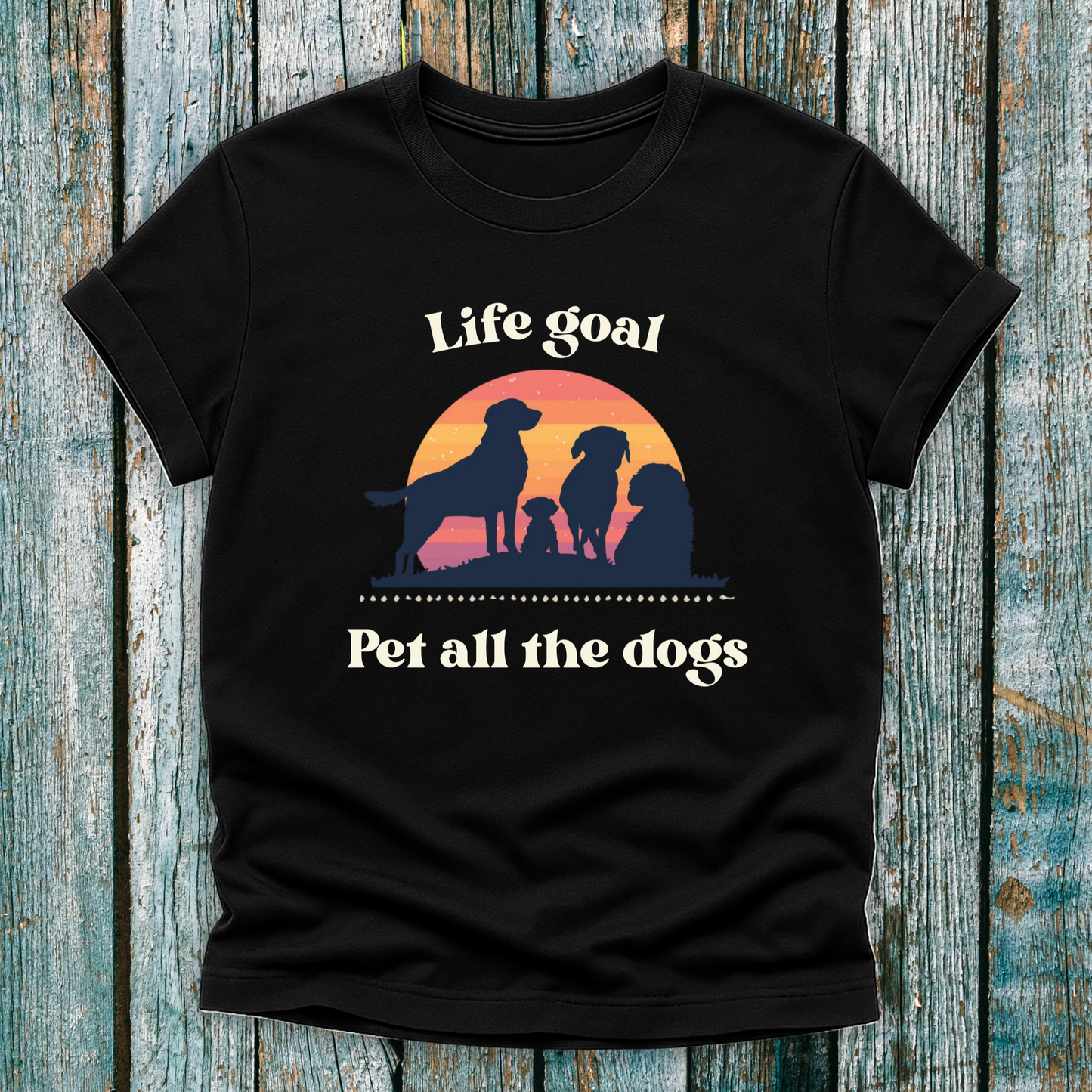 Black Life Goal Pet all the Dogs t-shirt with silhouette of dogs in front of sunset 