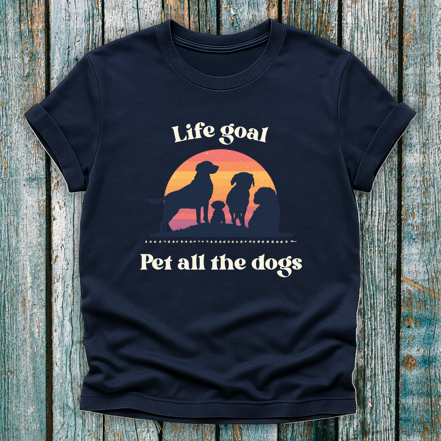 Navy Life Goal Pet all the Dogs t-shirt with silhouette of dogs in front of sunset 