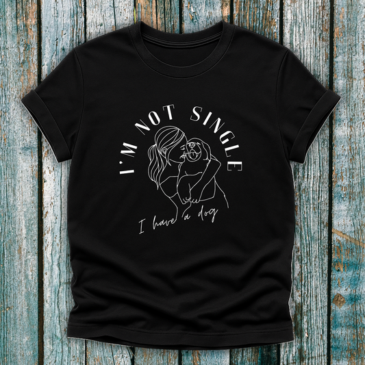 Black T-Shirt with I'm not single I have a dog and lady hugging a dog