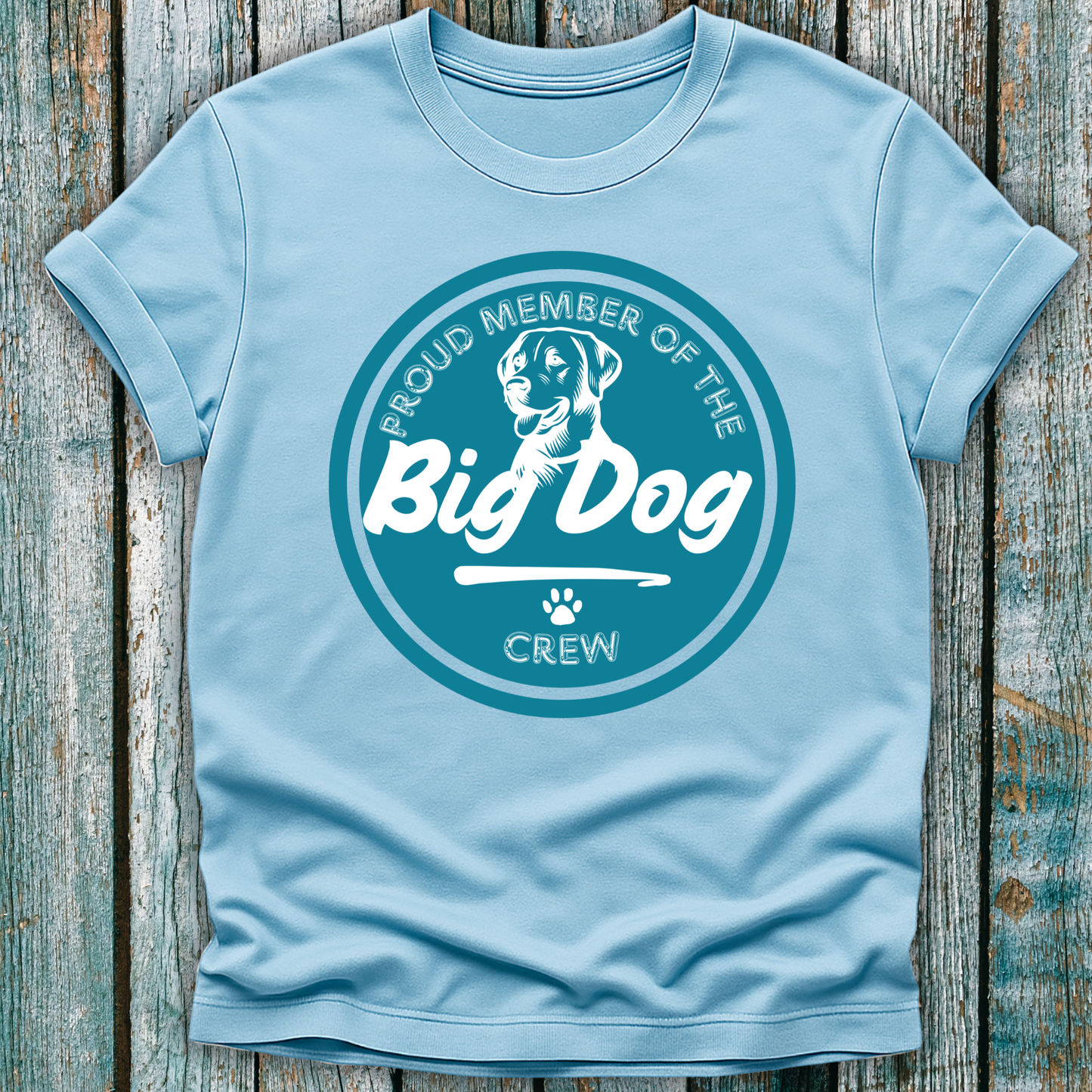 Blue T-Shirt with teal badge emblem saying proud member of the big dog crew