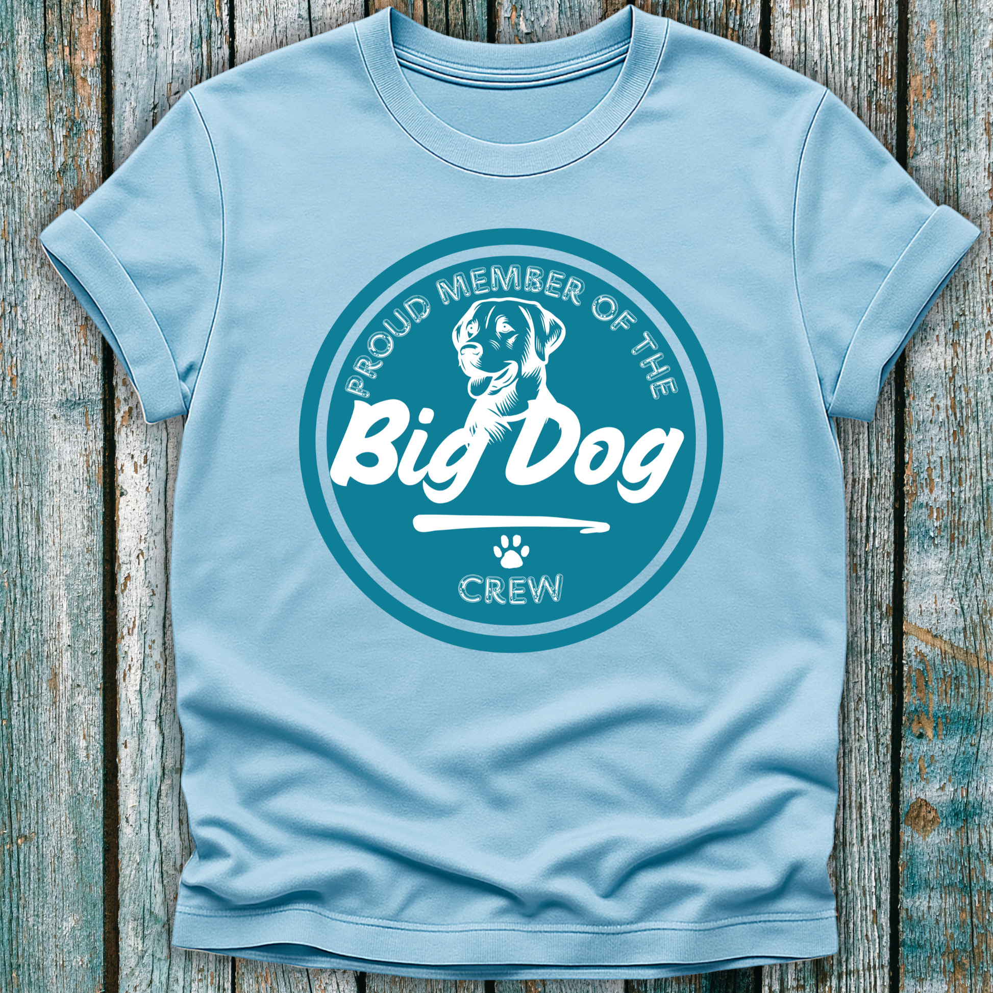 Blue T-Shirt with teal badge emblem saying proud member of the big dog crew