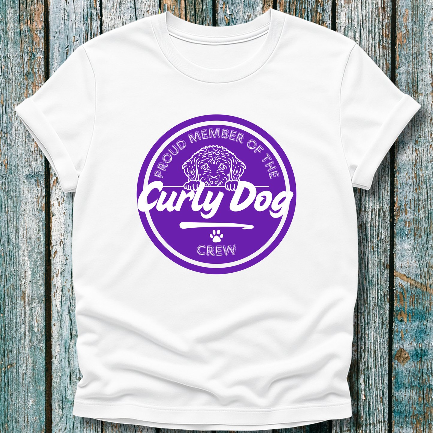 White t-shirt with purple graphic displaying proud member of the curly dog crew