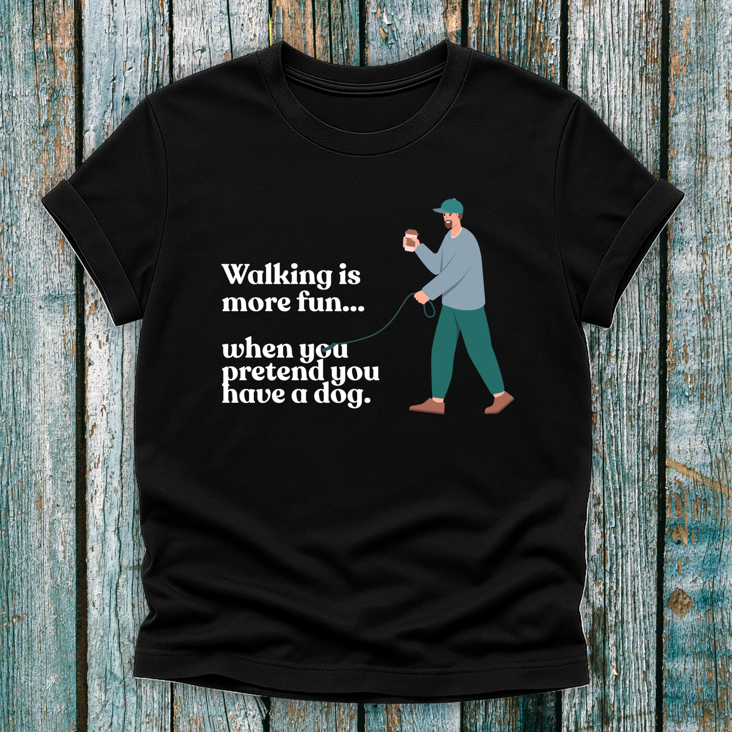 Black T-Shirt with 'walking is more fun...when you pretend you have a dog' text and a lone man walking with a lead