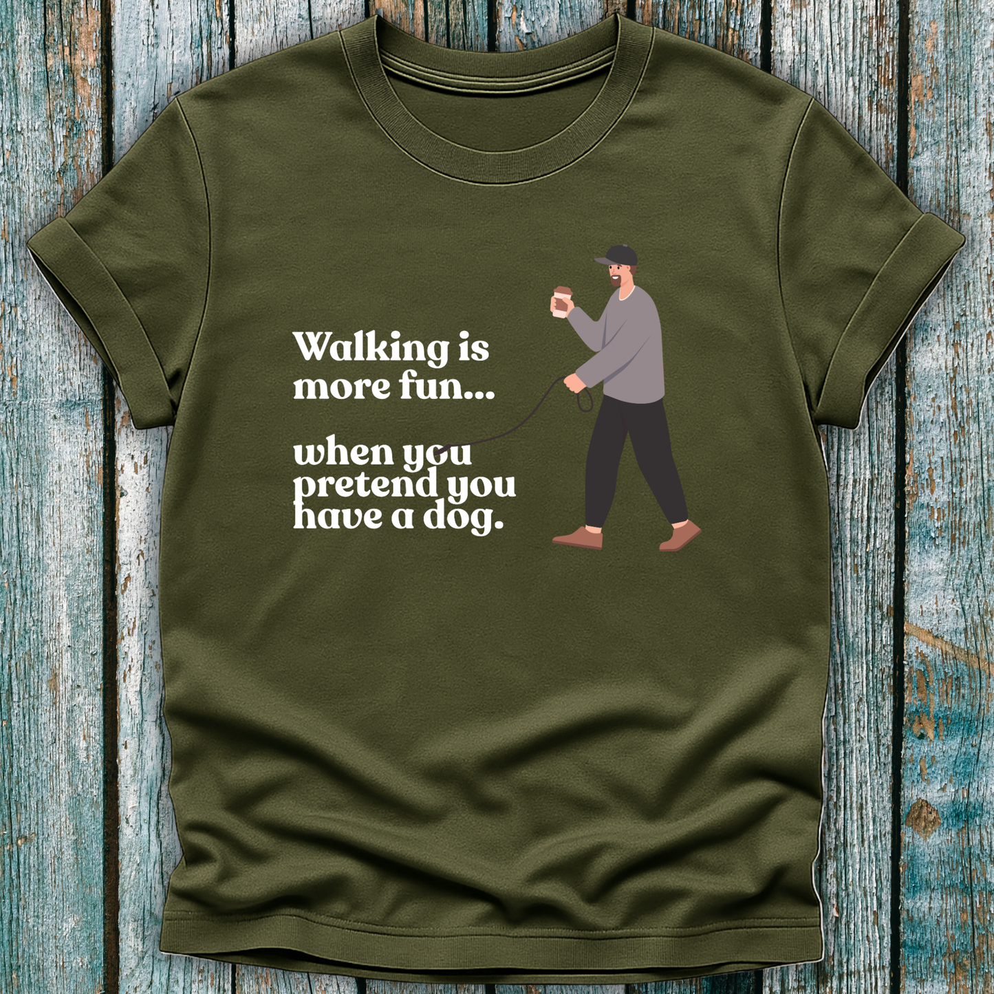 Green T-Shirt with 'walking is more fun...when you pretend you have a dog' text and a lone man walking with a lead