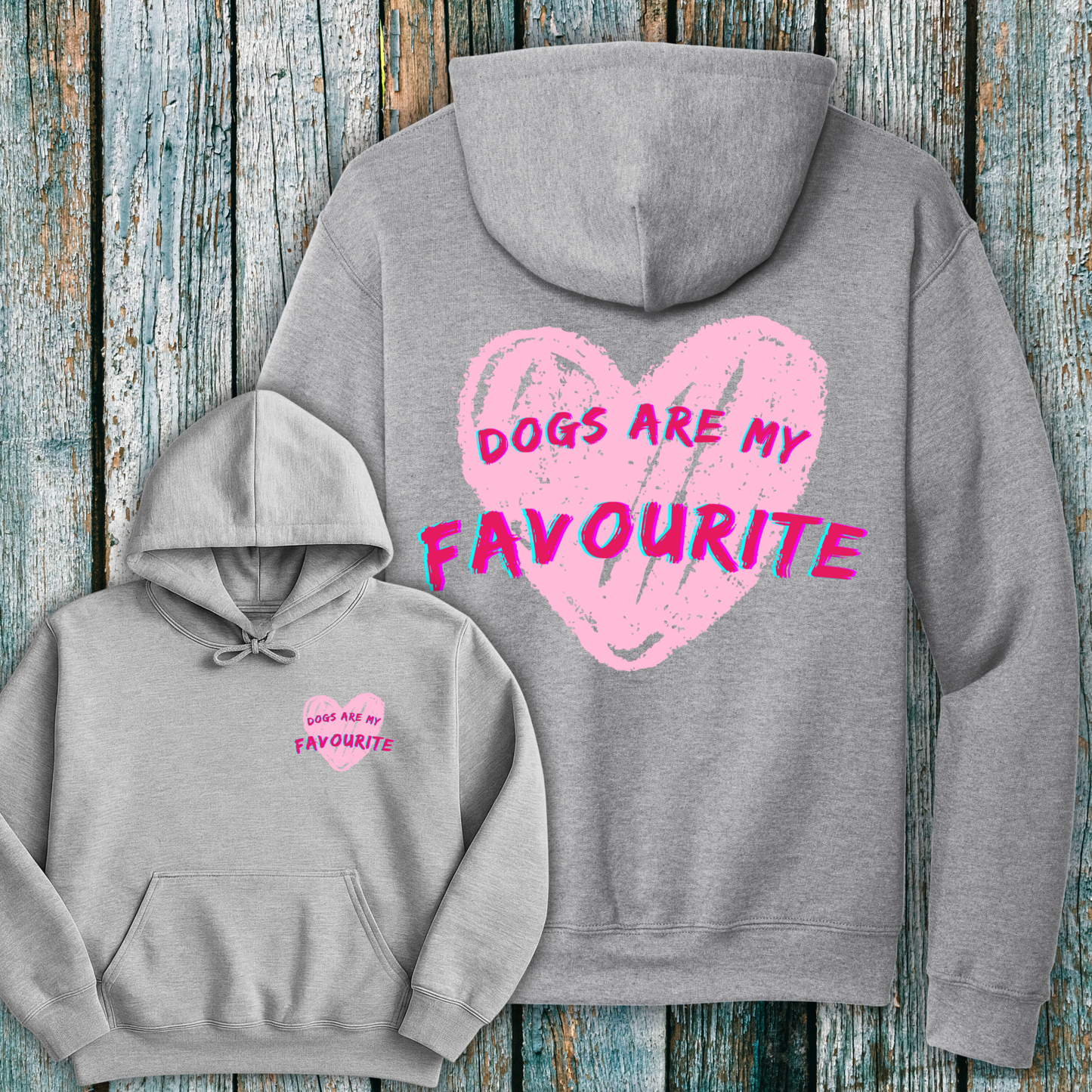 Gray hoodie with pink heart and Dogs are my Favourite design and text on a wooden surface