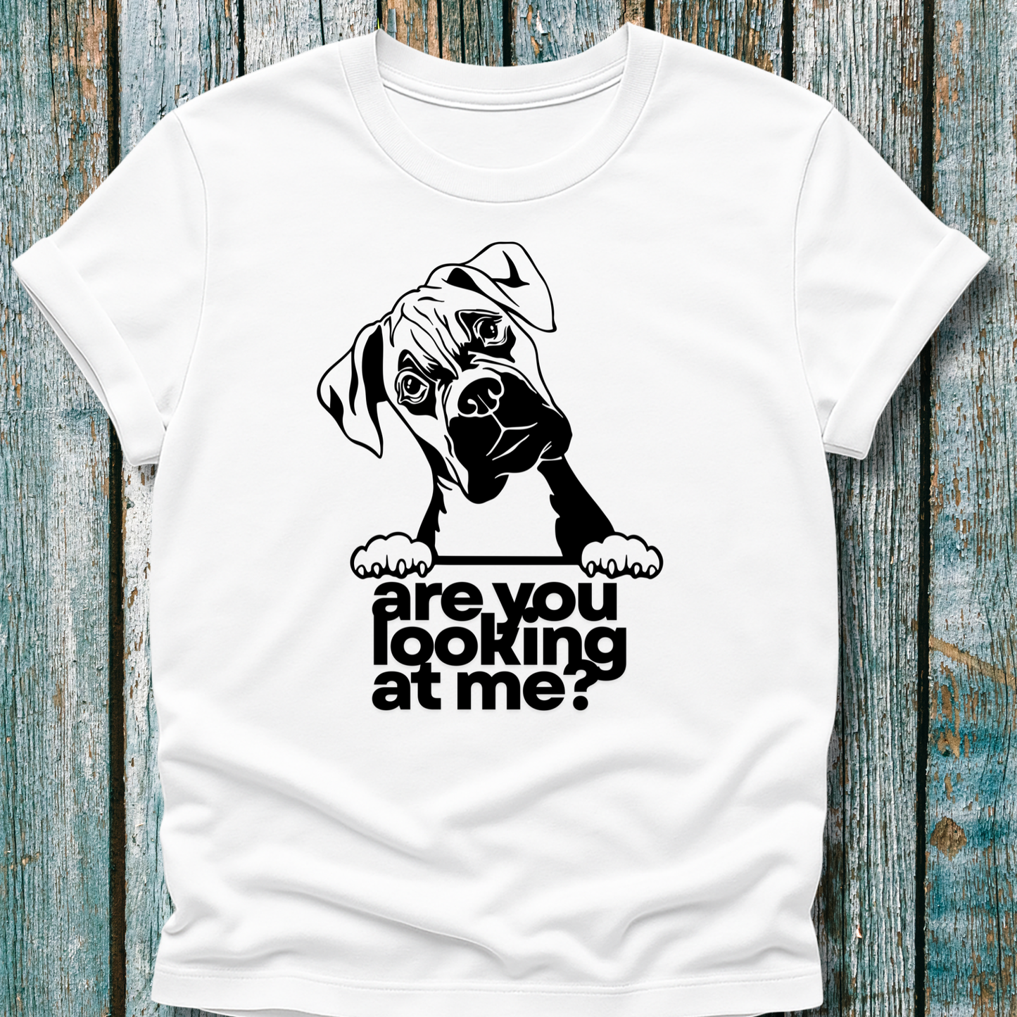 White t-shirt with a graphic of a boxer dog and text 'are you looking at me?' on a wooden surface.