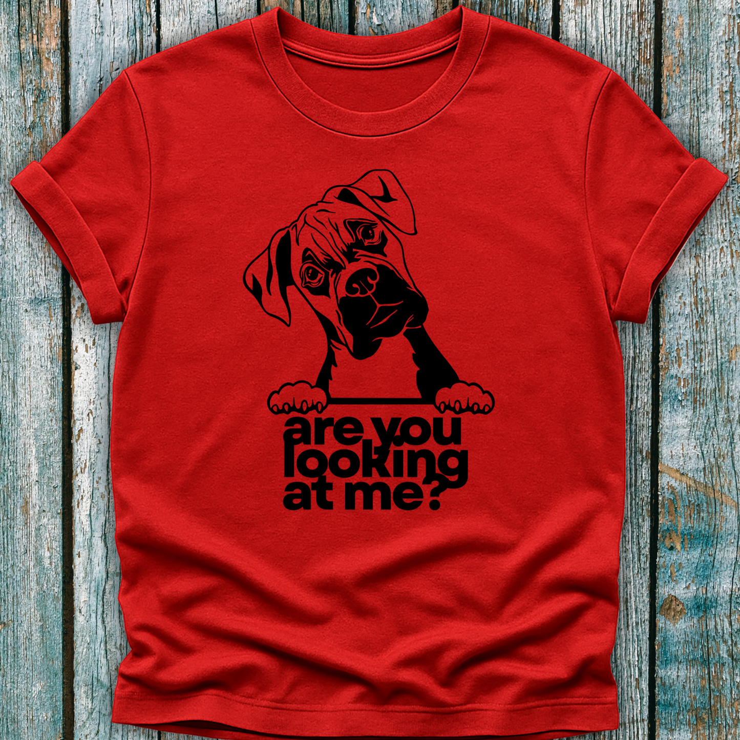 Red t-shirt with a graphic of a boxer dog and text 'are you looking at me?' on a wooden surface.