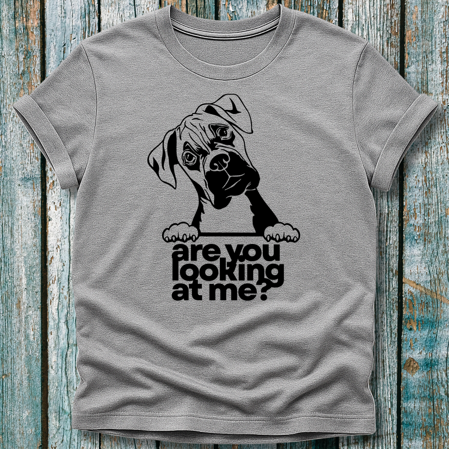 Grey t-shirt with a graphic of a boxer dog and text 'are you looking at me?' on a wooden surface.
