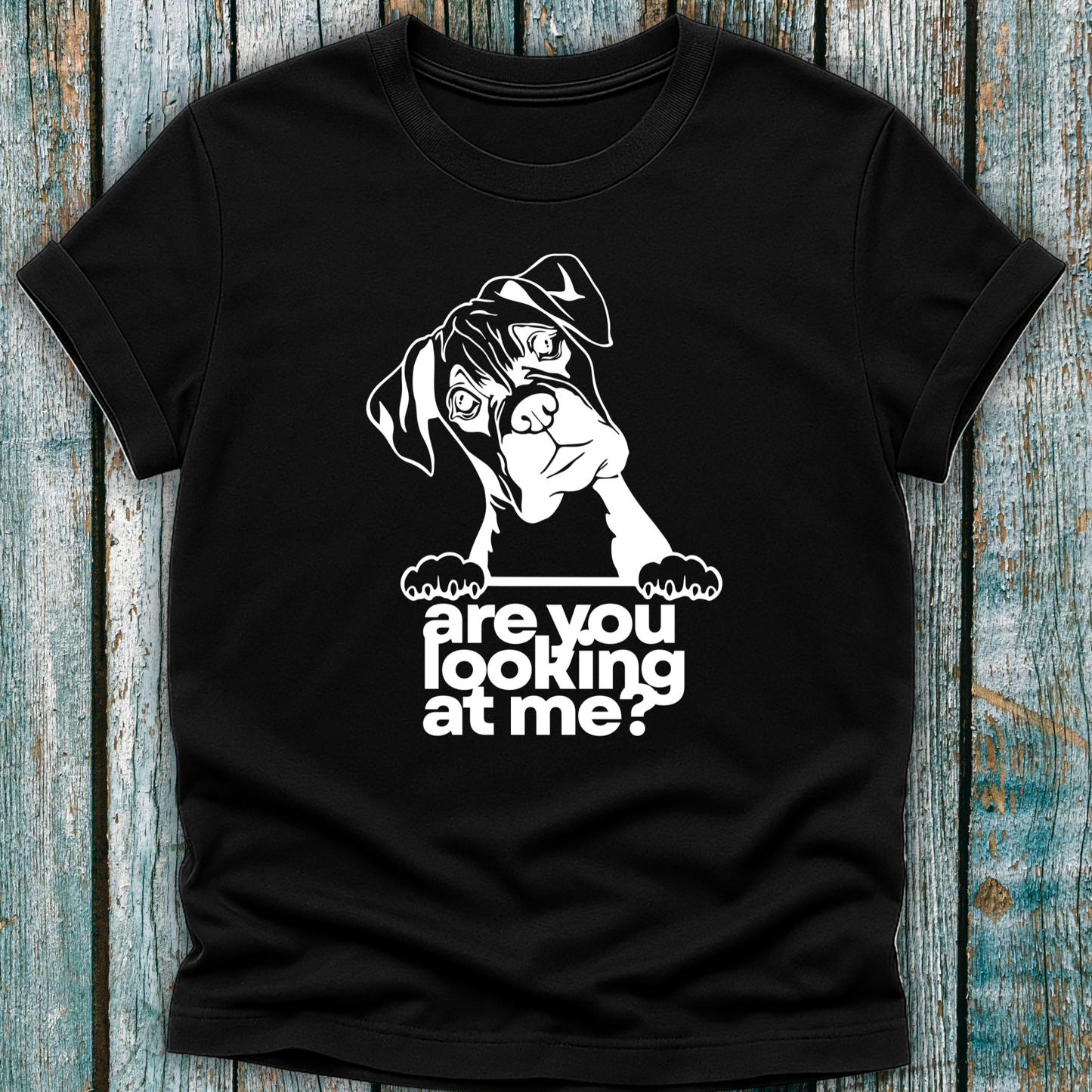 Black t-shirt with a graphic of a boxer dog and text 'are you looking at me?' on a wooden surface.