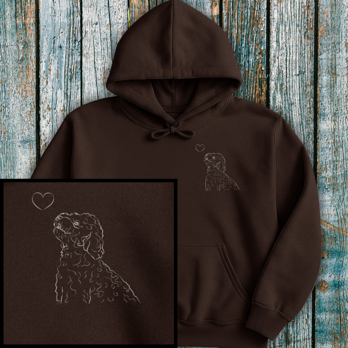 Brown hoodie with Cockapoo and a heart on a wooden surface