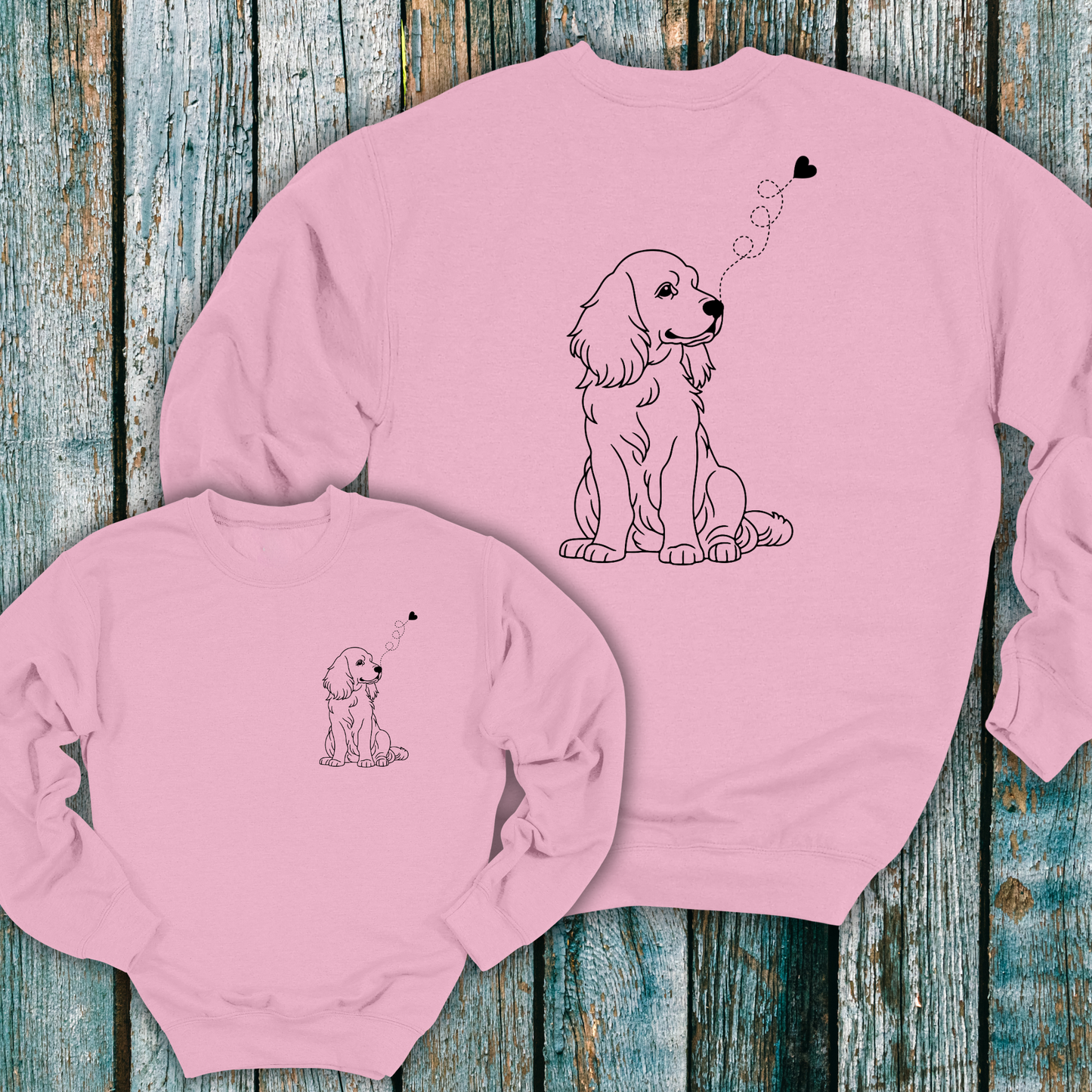 Pink sweatshirt with cute dog graphic on the front and back