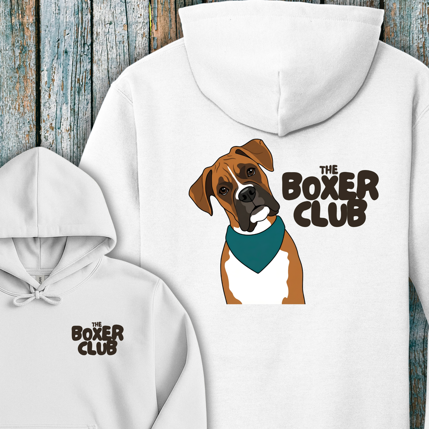 White hoodie with a boxer dog graphic and 'The Boxer Club' text on a wooden background