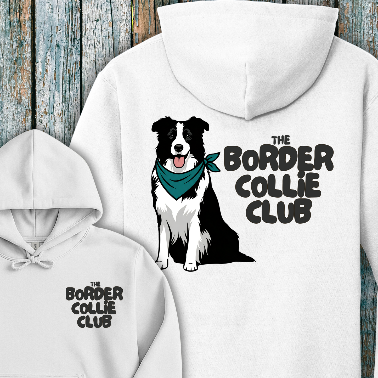 White hoodie with a Border Collie design and 'The Border Collie Club' text on a wooden background