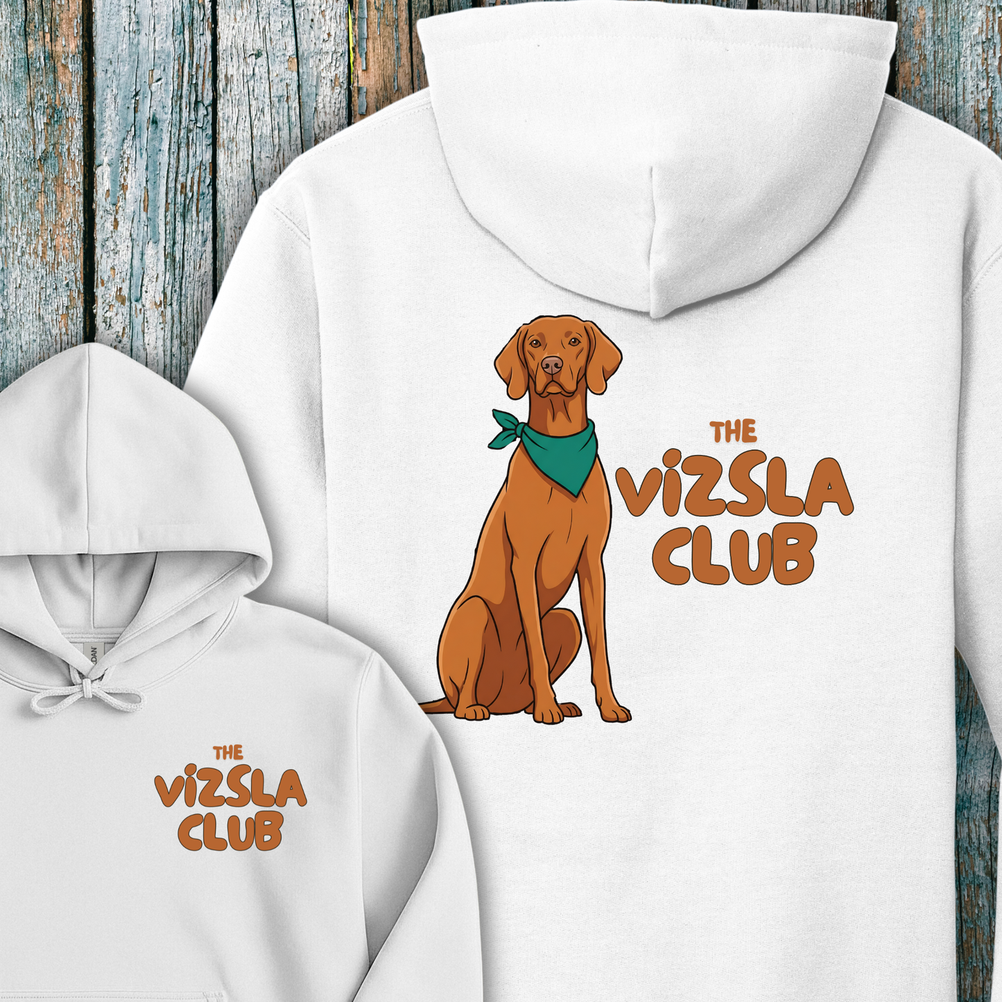 White hoodie with Vizsla dog illustration and 'The Vizsla Club' text on a wooden background
