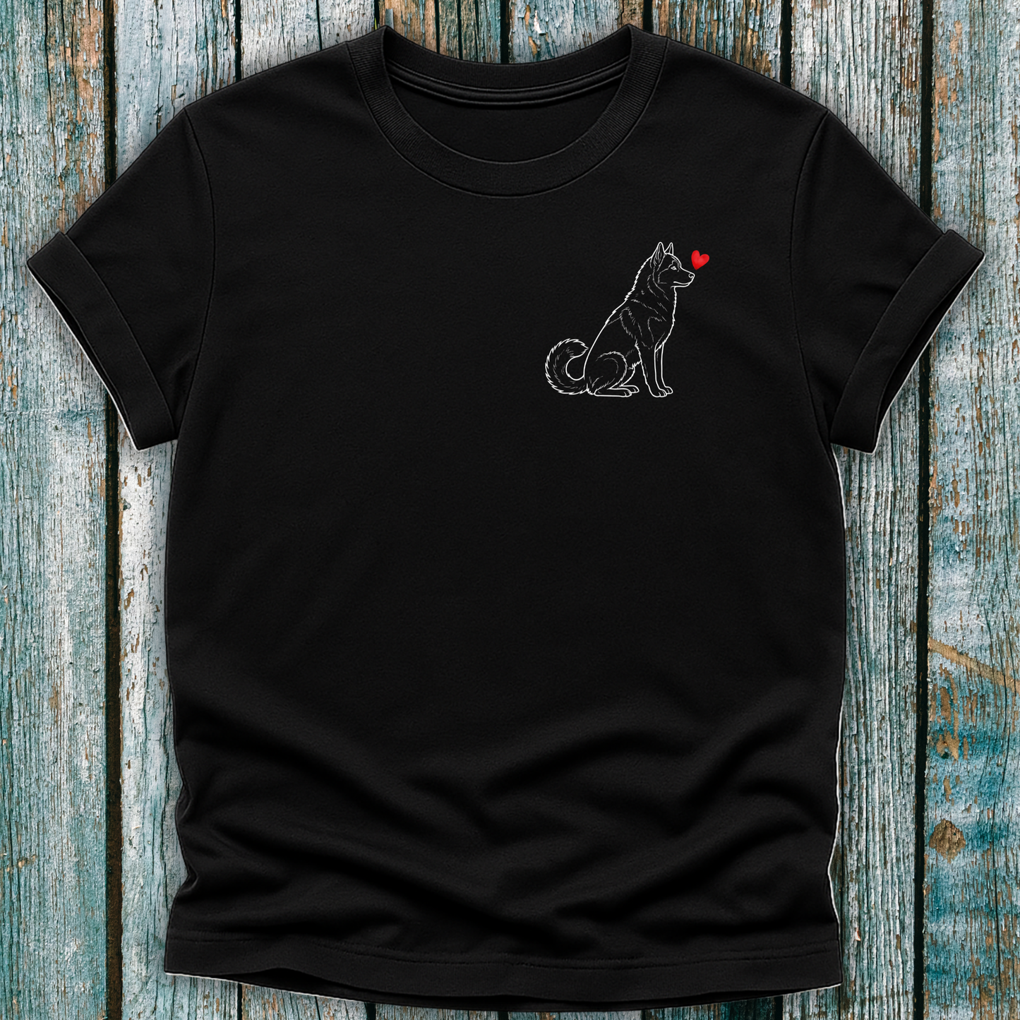 Black t-shirt with a Husky dog and heart design on a wooden surface