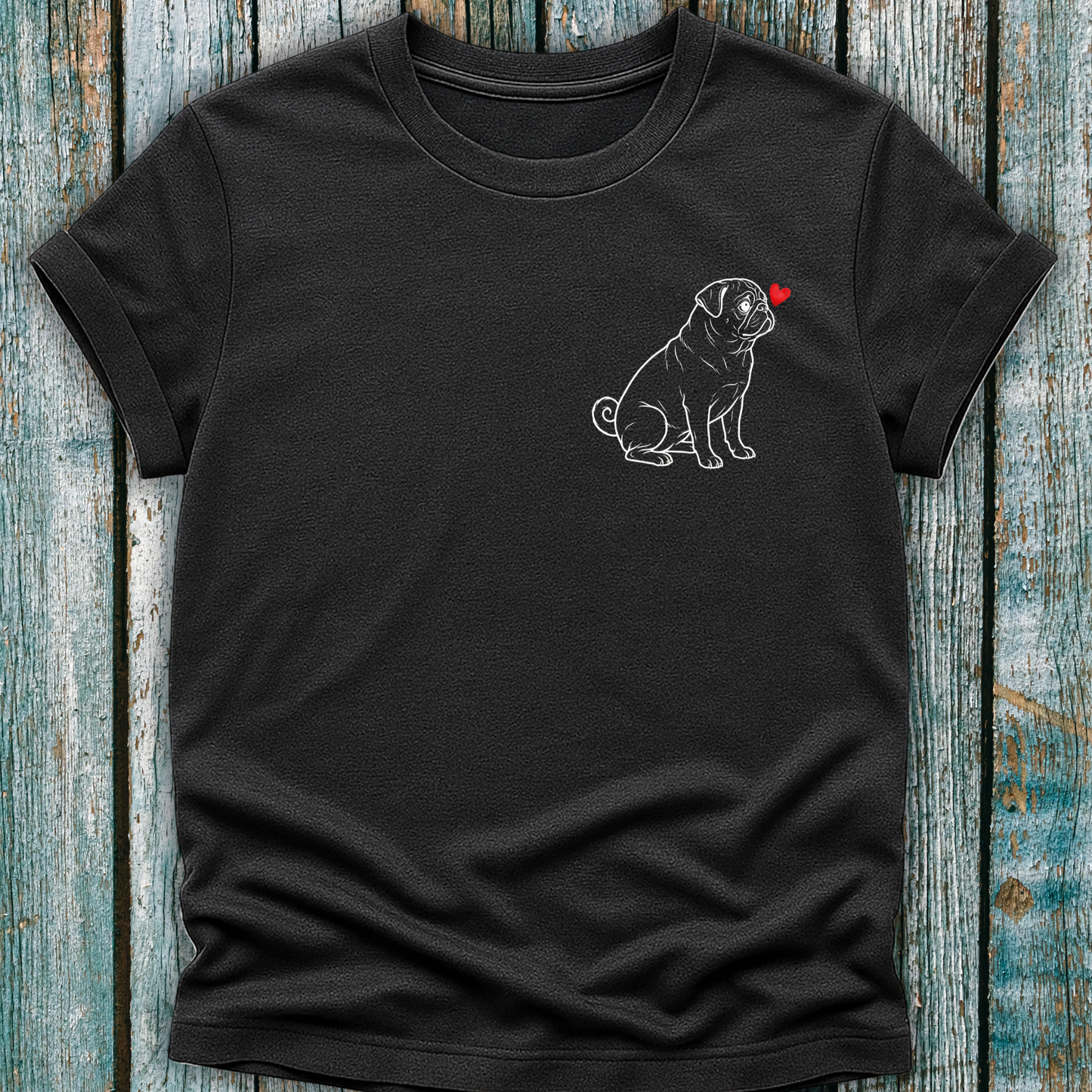 Dark Gray t-shirt with a Pug dog and heart design on a wooden surface
