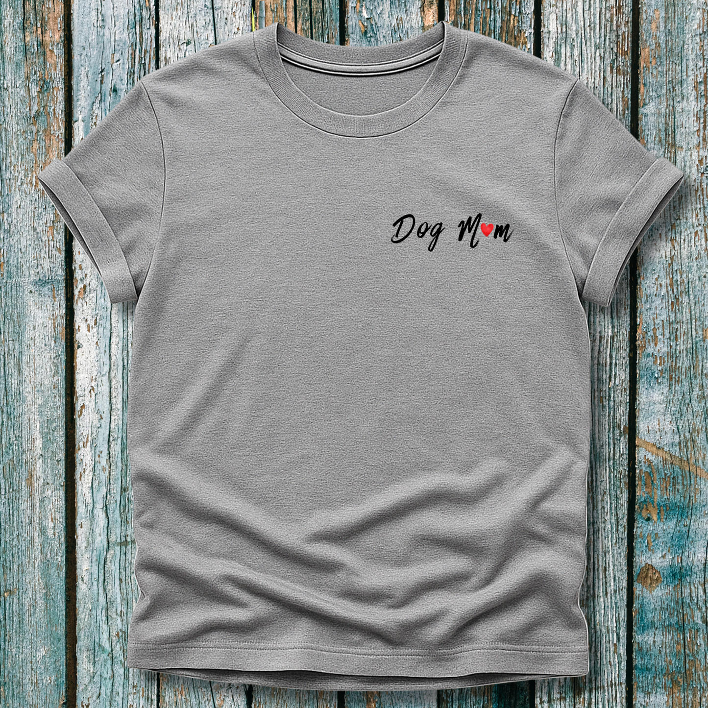 Gray t-shirt with 'Dog Mom' 'Dog Mum' text on a wooden surface