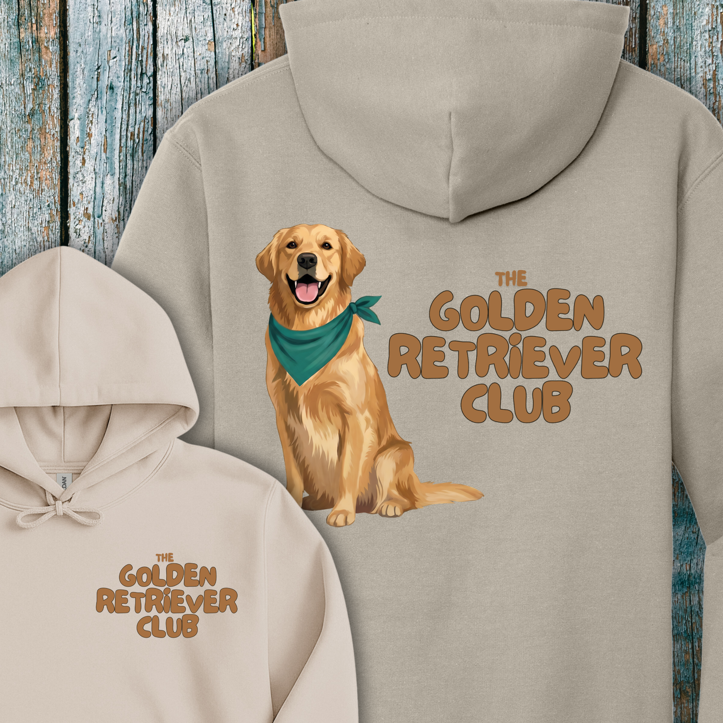 Beige hoodie with a Golden Retriever illustration and 'The Golden Retriever Club' text on a wooden background.
