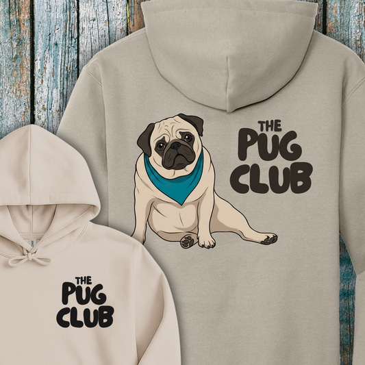 Beige hoodie with a pug graphic and 'The Pug Club' text on a wooden background
