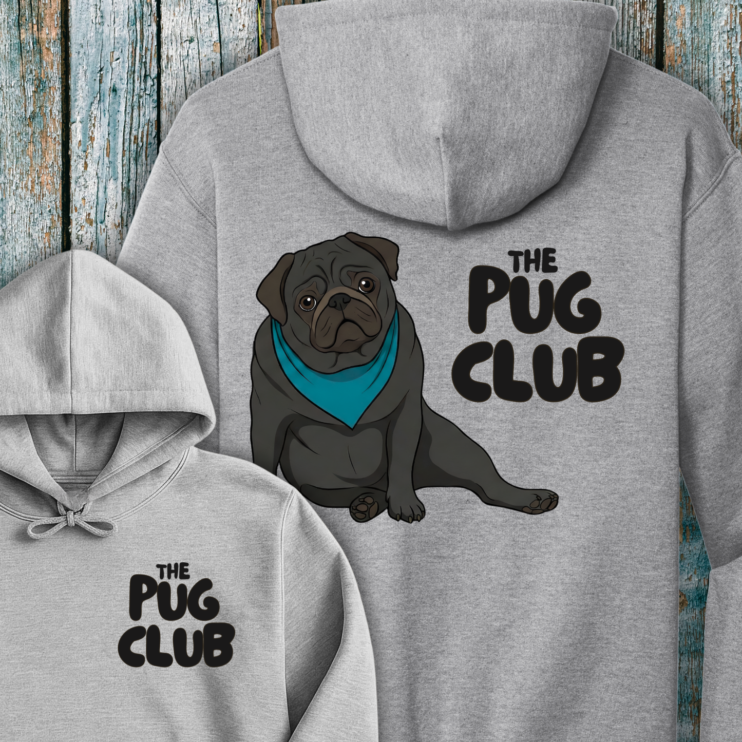 Gray hoodie with a pug illustration and 'The Pug Club' text on a wooden background