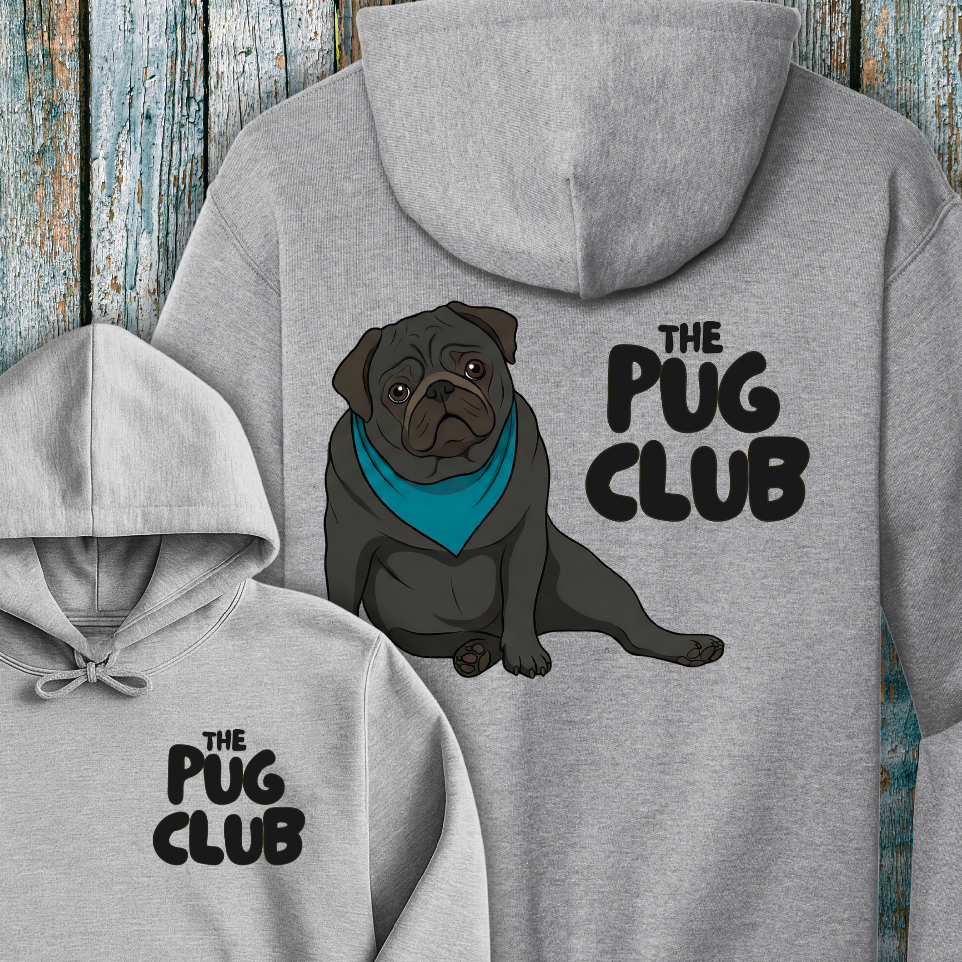 Gray hoodie with a pug illustration and 'The Pug Club' text on a wooden background