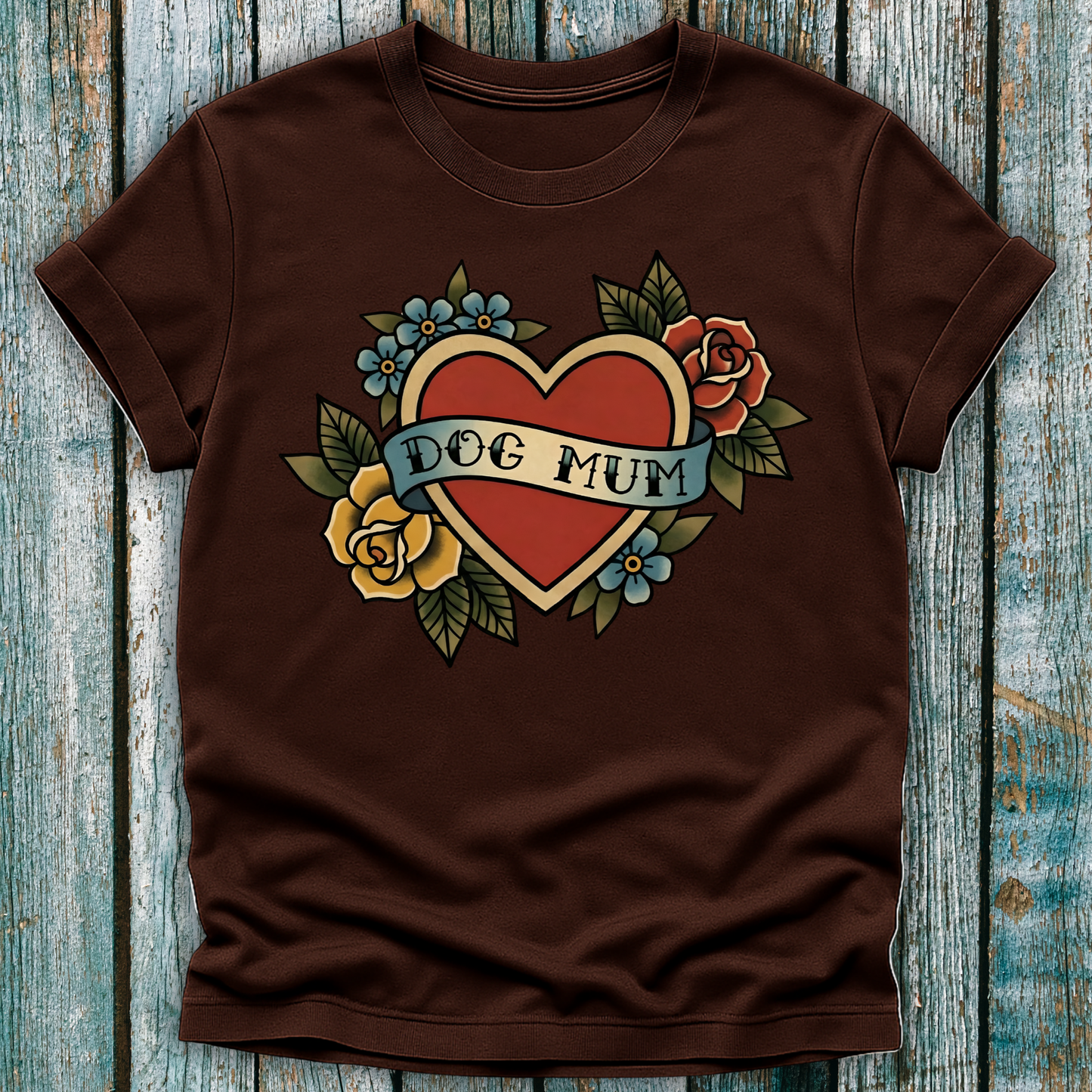 Brown t-shirt with a heart design and 'Dog Mum' text on a wooden surface