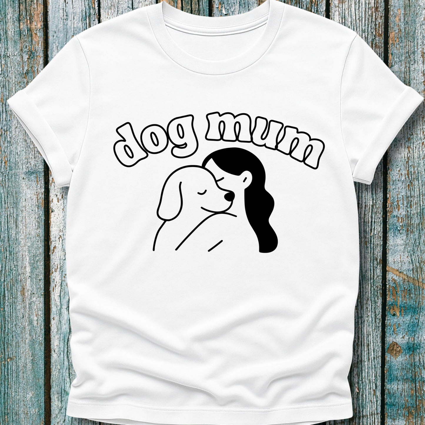 White t-shirt with 'dog mum' text and a graphic of a woman and dog on a wooden surface