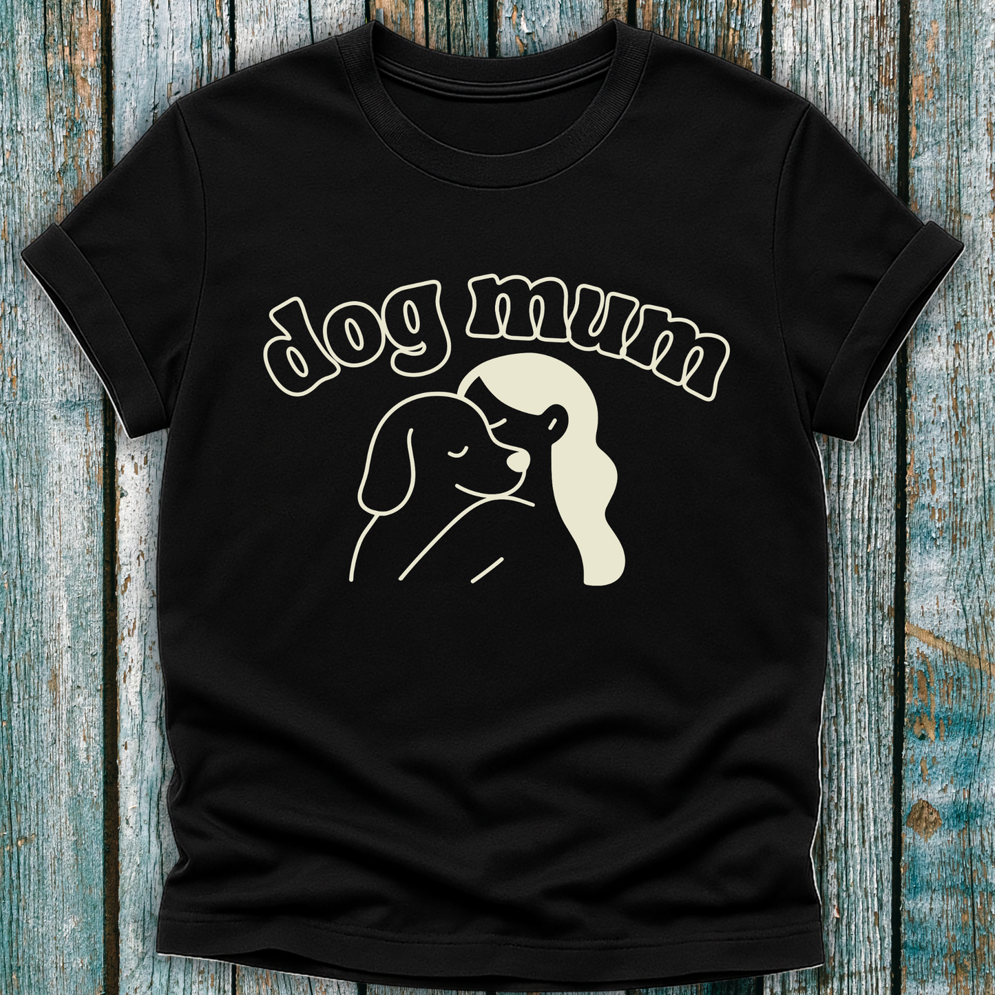 Black t-shirt with 'dog mum' and a graphic of a woman and dog on a wooden surface