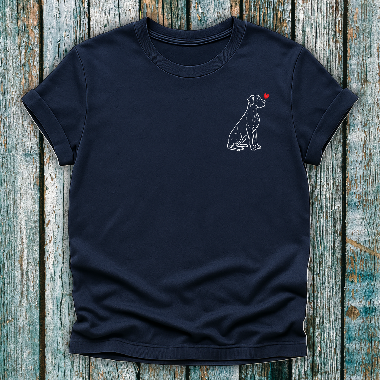 Navy t-shirt  with a Great Dane dog illustration with a red heart on a wooden surface