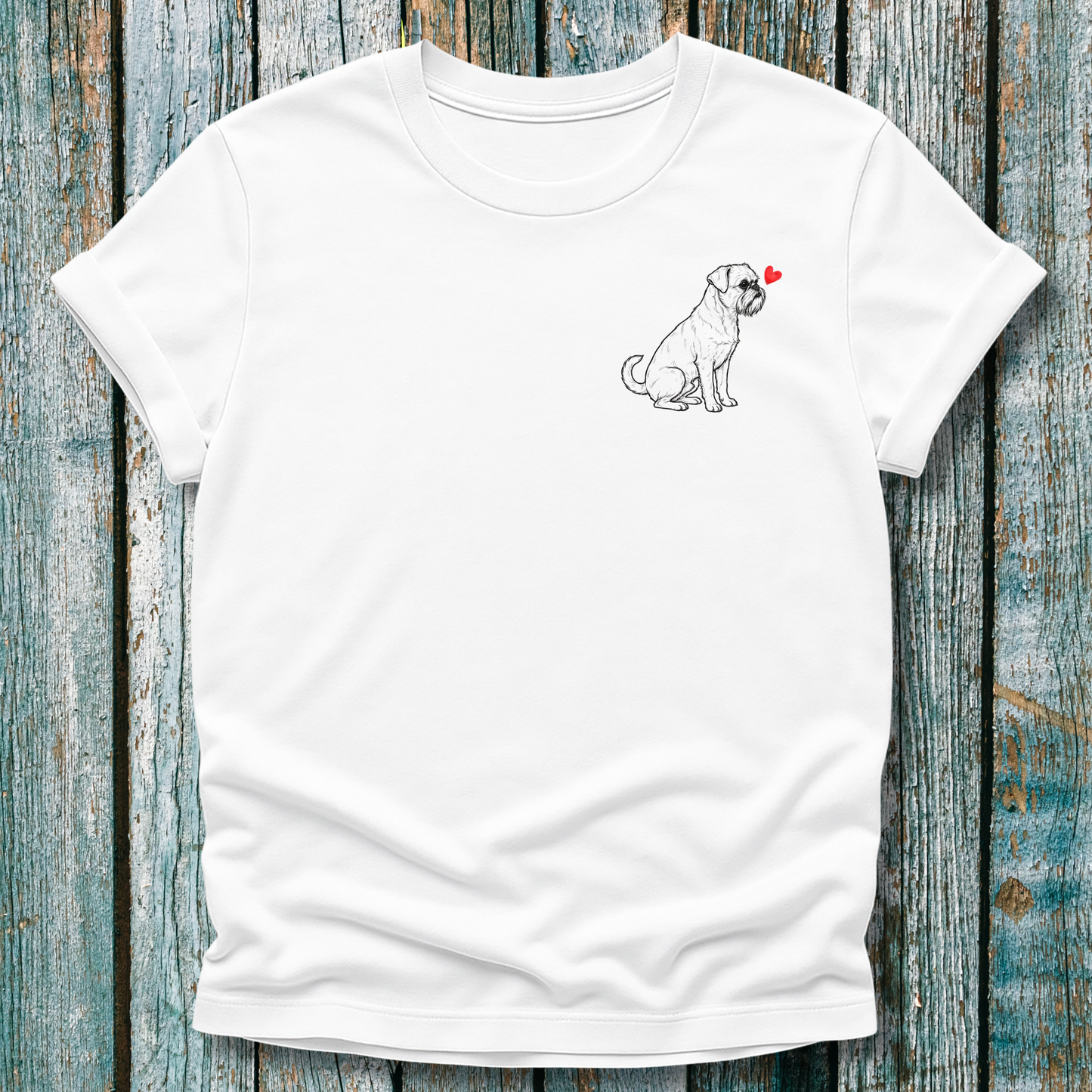 White t-shirt with a Griffon dog and heart design on a wooden surface