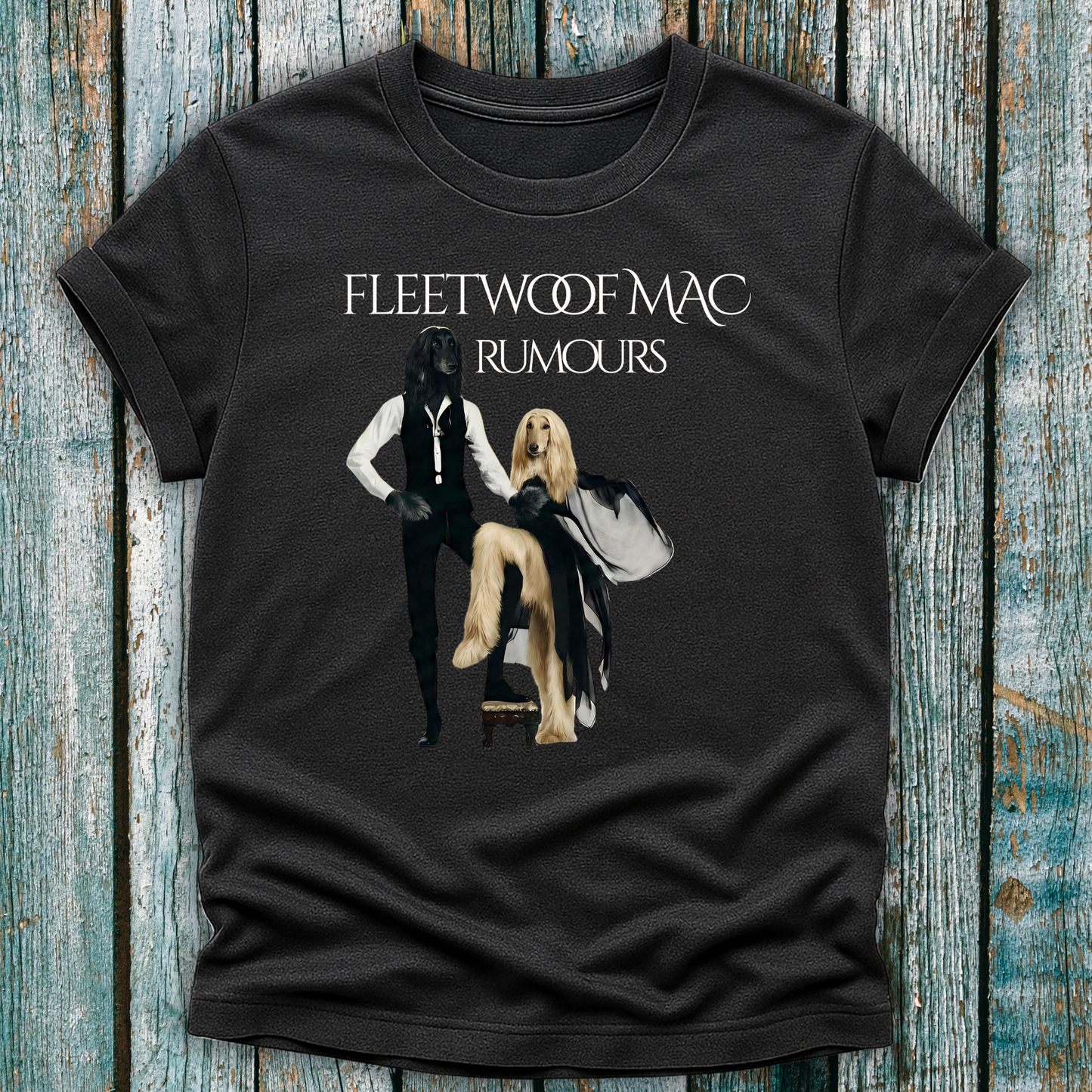 Dark Grey t-shirt with Fleetwoof Mac 'Rumours' design on a wooden surface