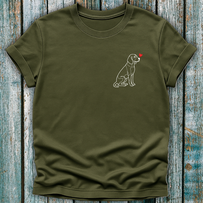 Green t-shirt with a beagle dog graphic and a love heart on a wooden surface